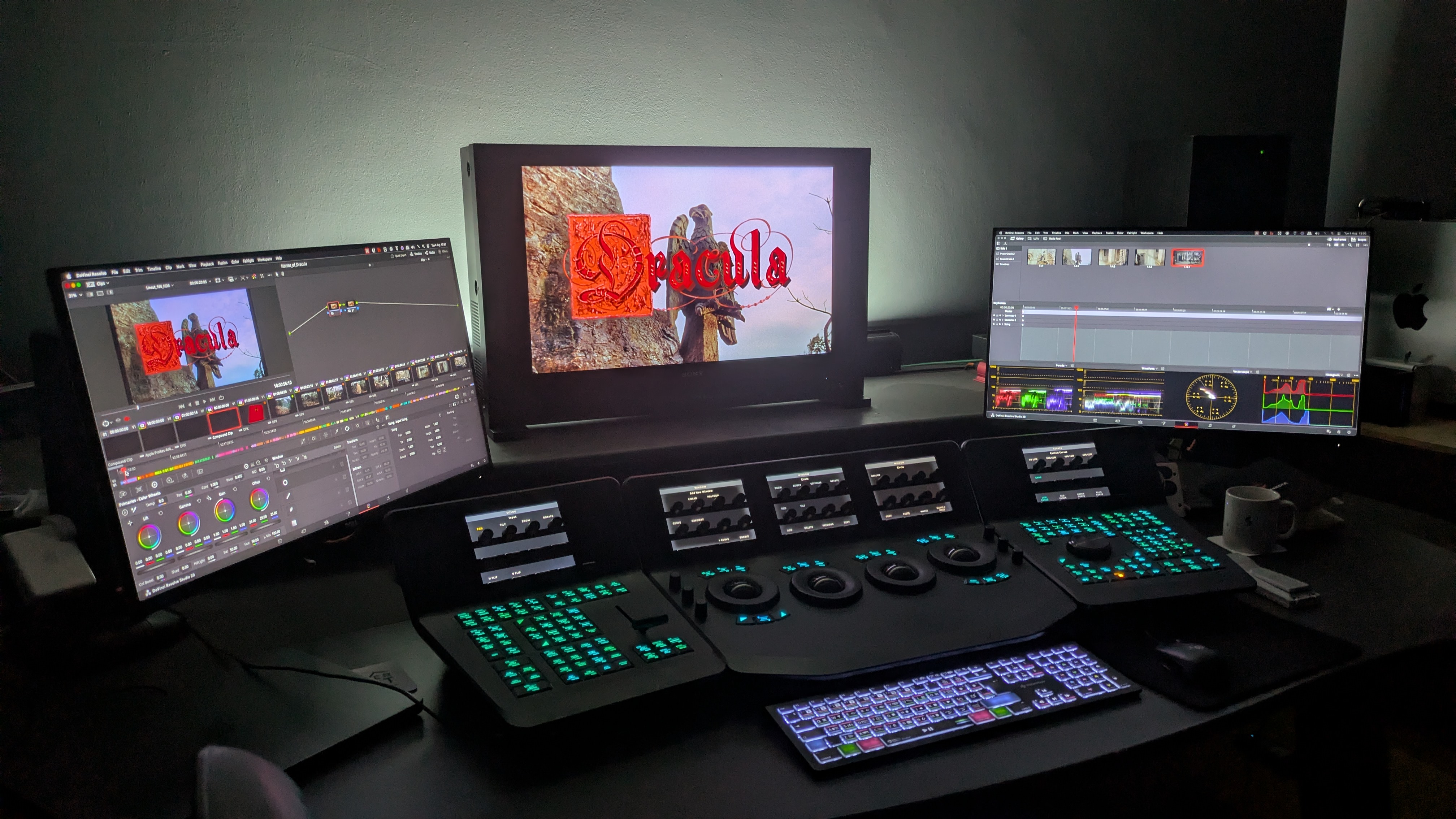 Grading desk at Silversalt Restoration with Dracula title screen on monitor