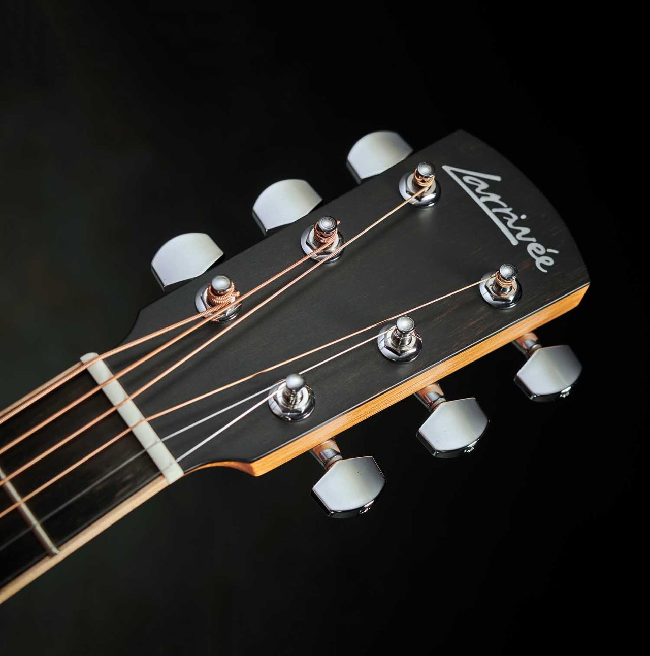 The C-03R-TE's bone nut matches the saddle.