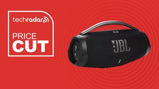 JBL Boombox 3 Portable Bluetooth Speaker on red background with TechRadar price cut sign