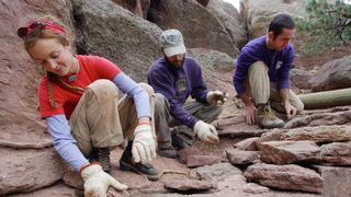 employees of the City of Boulder Open Space and Mountain Parks, rebuild the Upper Crown Rock bouldering access trail 