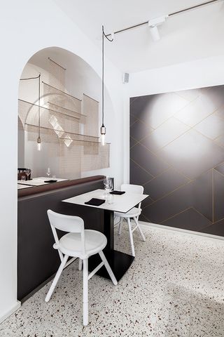 Restaurant designed with tiles, golden viper granite and a custom-designed butcher block