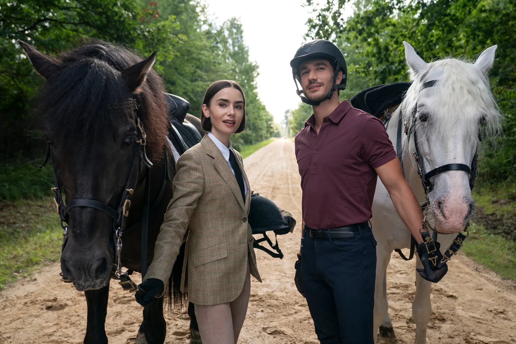 Lily Collins as Emily and Eugenio Franceschini as Marcello in Emily in Paris