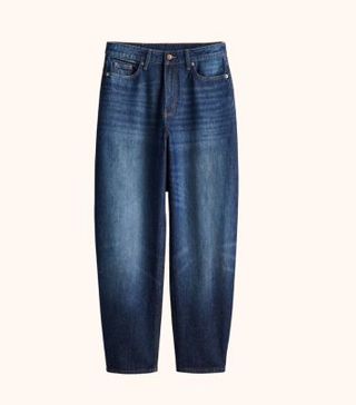 Image of dark denim barrel leg jeans