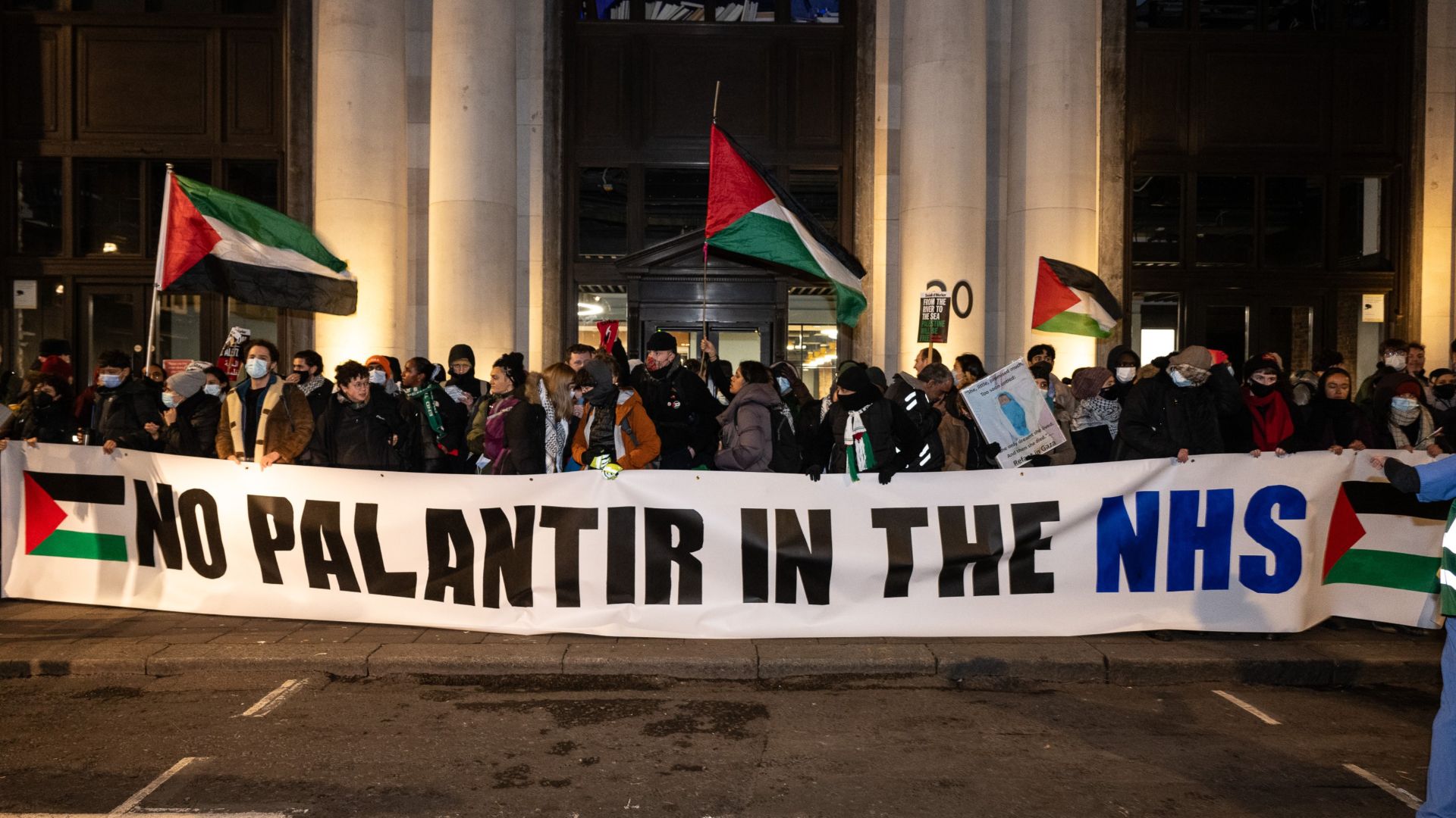Health Workers for a Free Palestine, many of them striking Junior Doctors, picket military intelligence company Palantir in Soho square on December 21, 2023 in London, England.