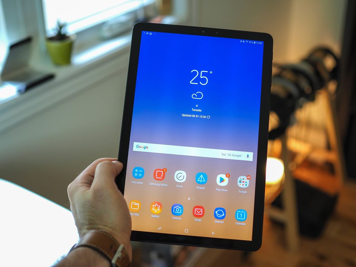 Samsung Galaxy Tab S4 in-hand