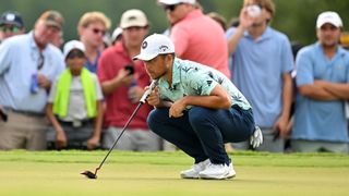 Xander Schauffele putting in the fourth round of the 2023 Tour Championship