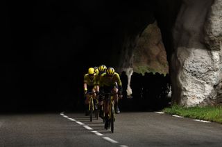 The pack of riders cycles during the 7th stage of the Paris-Nice cycling race, 109,3 km between Nice and Auron, on March 15, 2025. (Photo by Anne-Christine POUJOULAT / AFP)