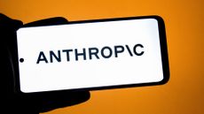 Logo of AI startup Anthropic, developer of the Claude Opus 4 and Sonnet 4 AI models, pictured on a smartphone held in a human hand.
