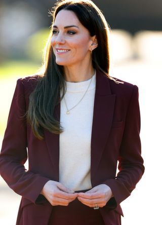 Kate Middleton in a plum suit