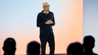 Microsoft CEO Satya Nadella speaking on stage during an event at the Microsoft campus in Redmond, Washington, US. 