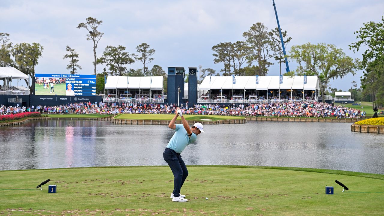 Scottie Scheffler hits his tee shot on the 17th hole at TPC Sawgrass