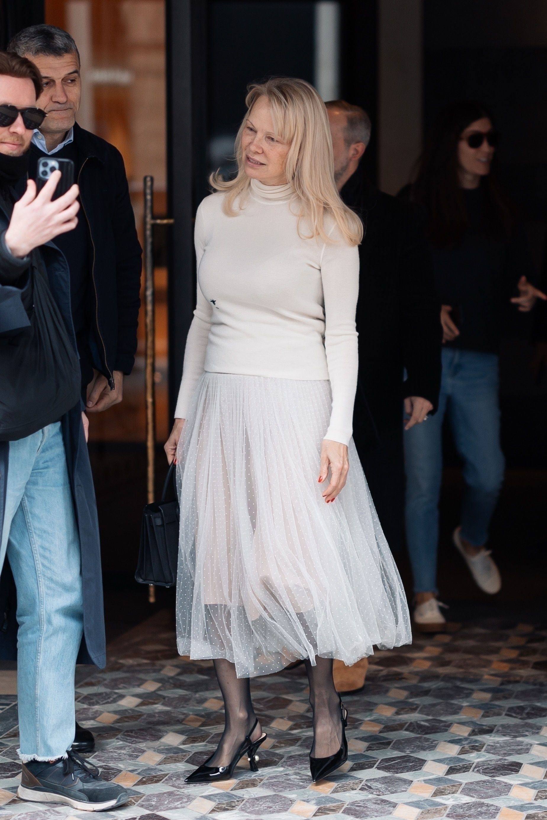 Pamela Anderson wears a tulle skirt.