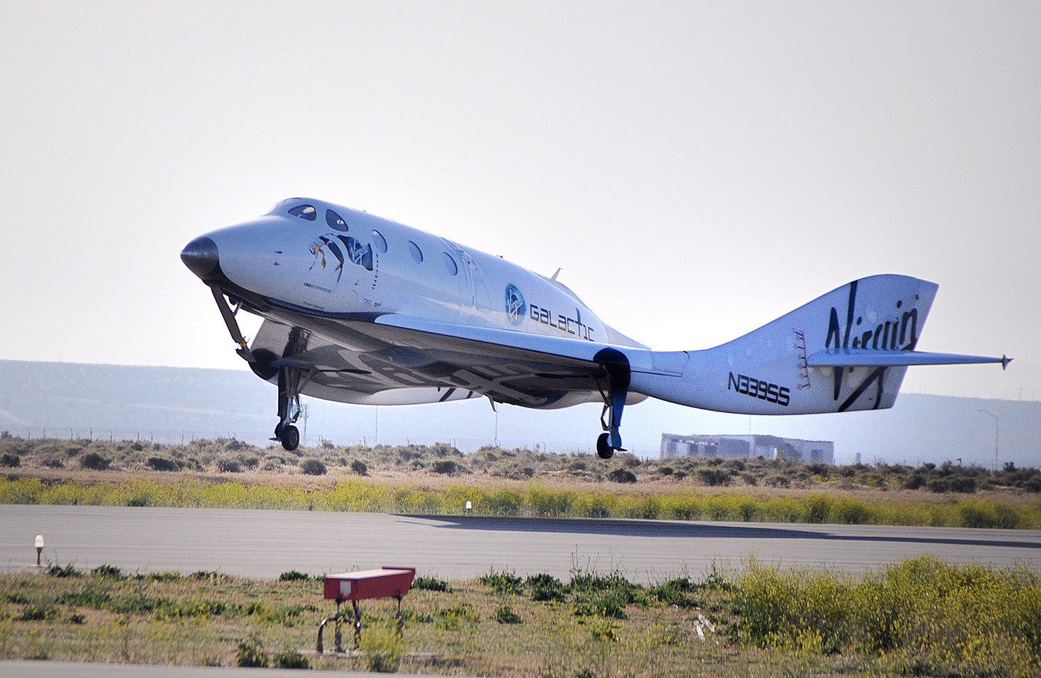 SpaceShipTwo makes a May 4, 2011 landing on Runway 30 at the Mojave Air and Space Port in California. Touch down signaled the successful end to the craft&#039;s 7th glide test and, for the first time, evaluation of its novel feather re-entry system.