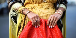 Woman with Pastel Multi-Coloured Nails