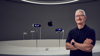 Tim Cook standing in front of the Vision Pro headset