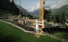 image of The Throne 3D-printed portable toilet installed on Swiss mountainside at construction site