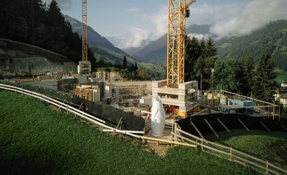 image of The Throne 3D-printed portable toilet installed on Swiss mountainside at construction site