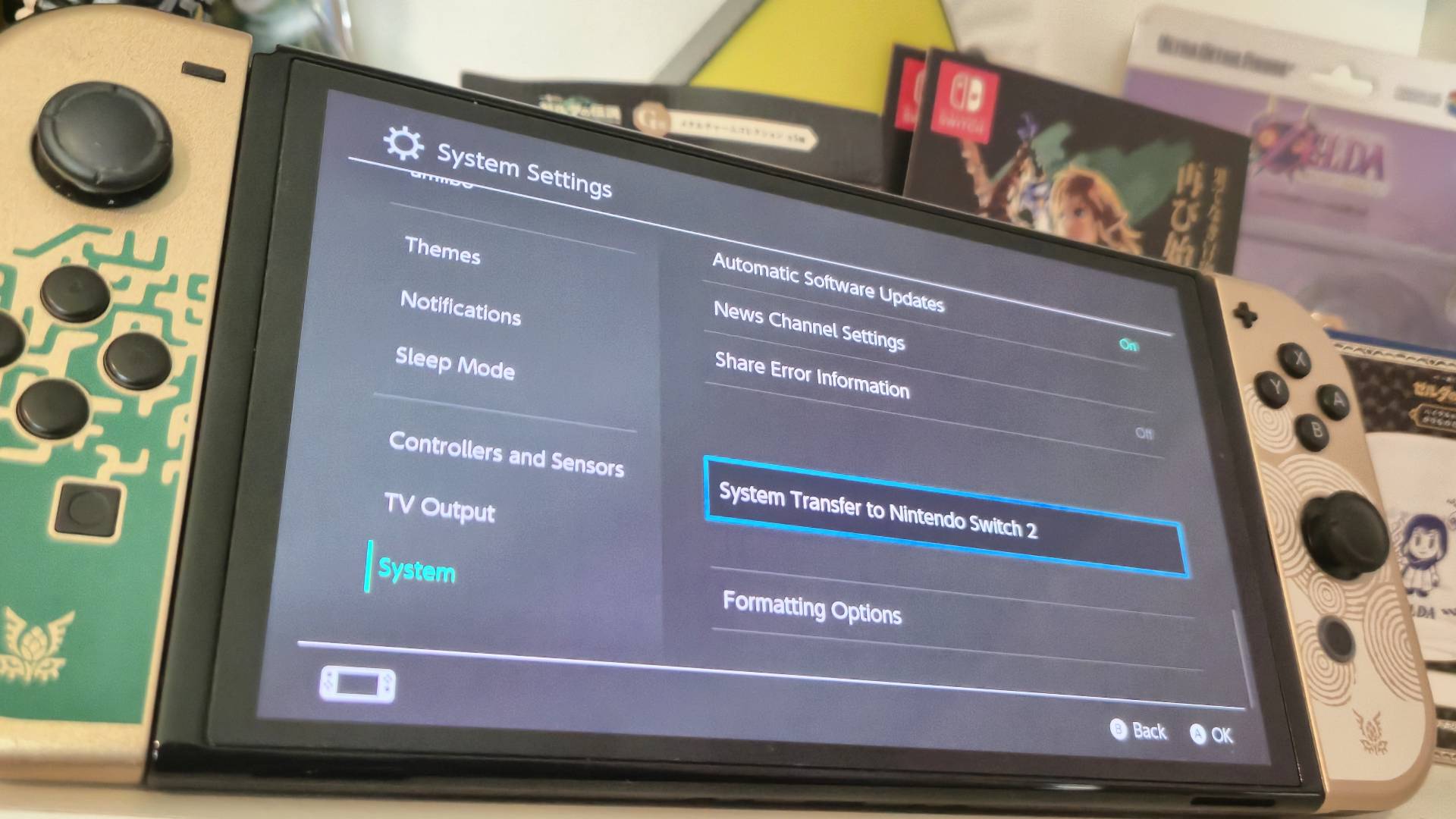 Photo of the OLED Tears of the Kingdom Nintendo Switch showing the Switch 2 transfer settings screen.
