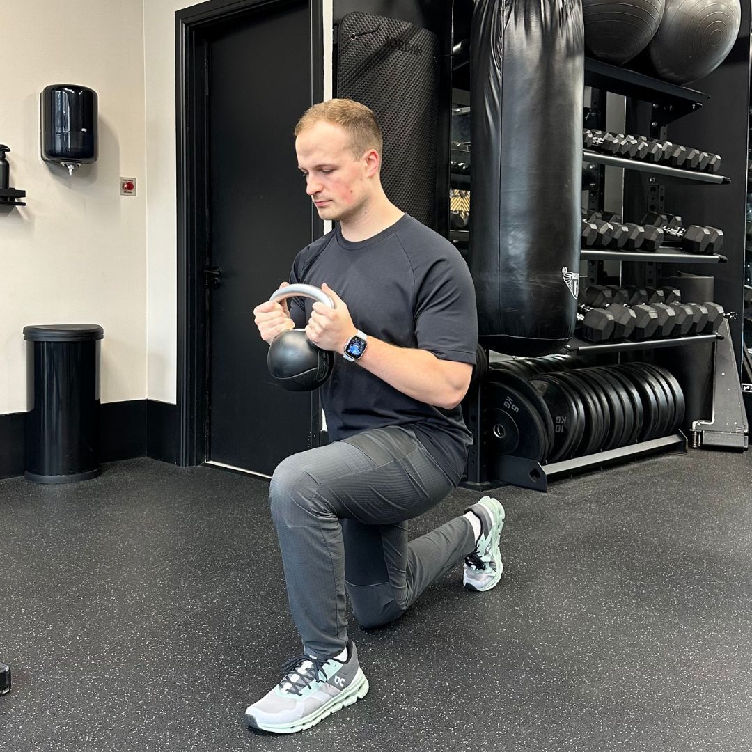 Personal trainer Ollie Thompson demonstrating a three-way lunge