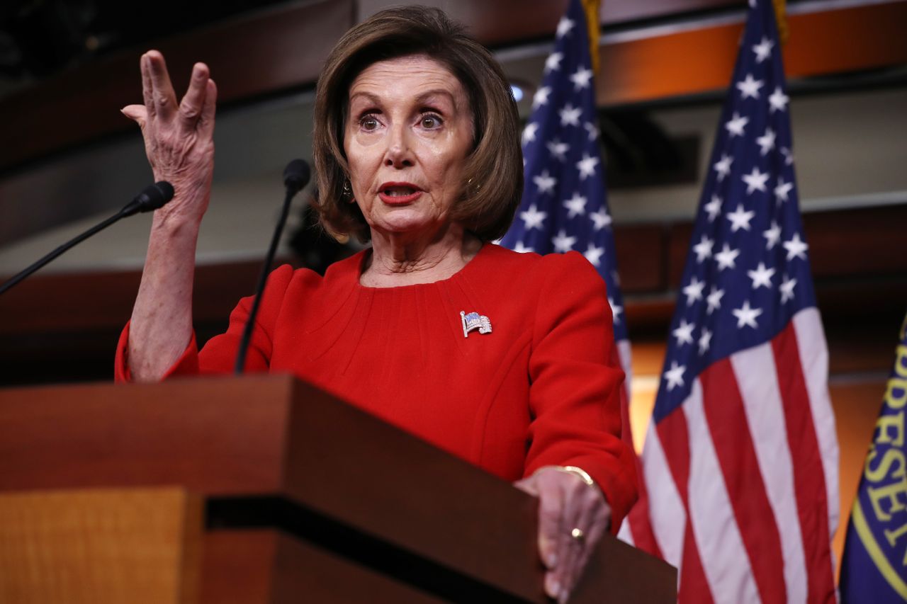 Nancy Pelosi talks to media