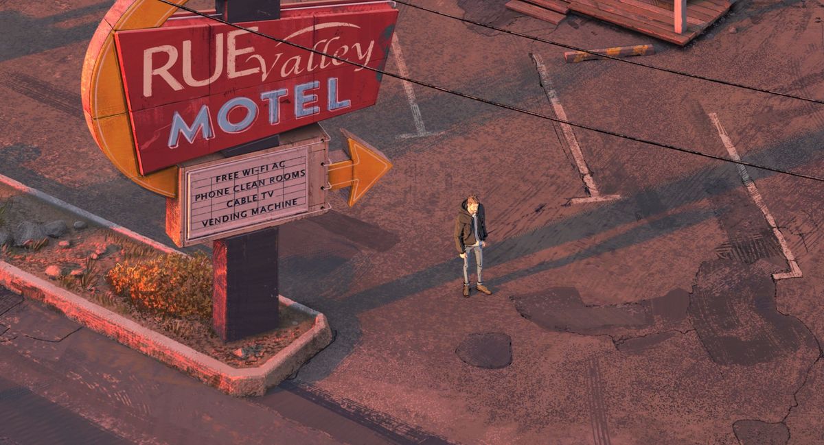 Standing next to the motel sign