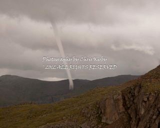 Chris Kirby took this photo of a twister on Saturday afternoon (July 28) near Mount Evans, Colo. He sent the photo to the National Weather Service staff, who verified it was the second-highest tornado in US history.