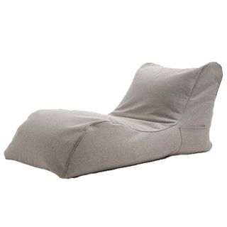 A chaise longue style bean bag in grey.