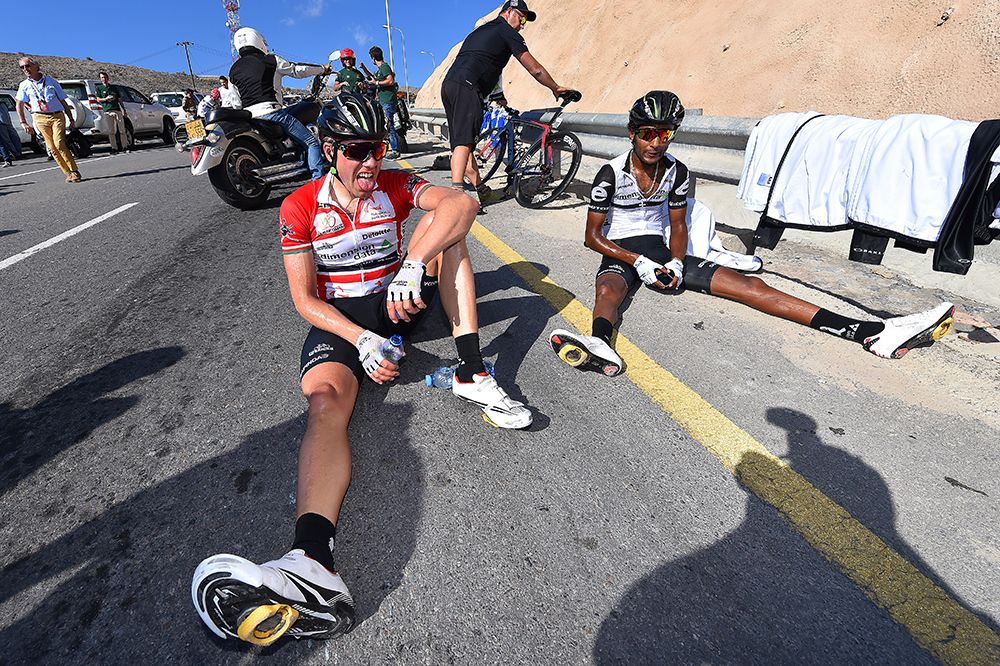 Edvald Boasson Hagen and Merhawi Kudus take a rest after completing stage 4