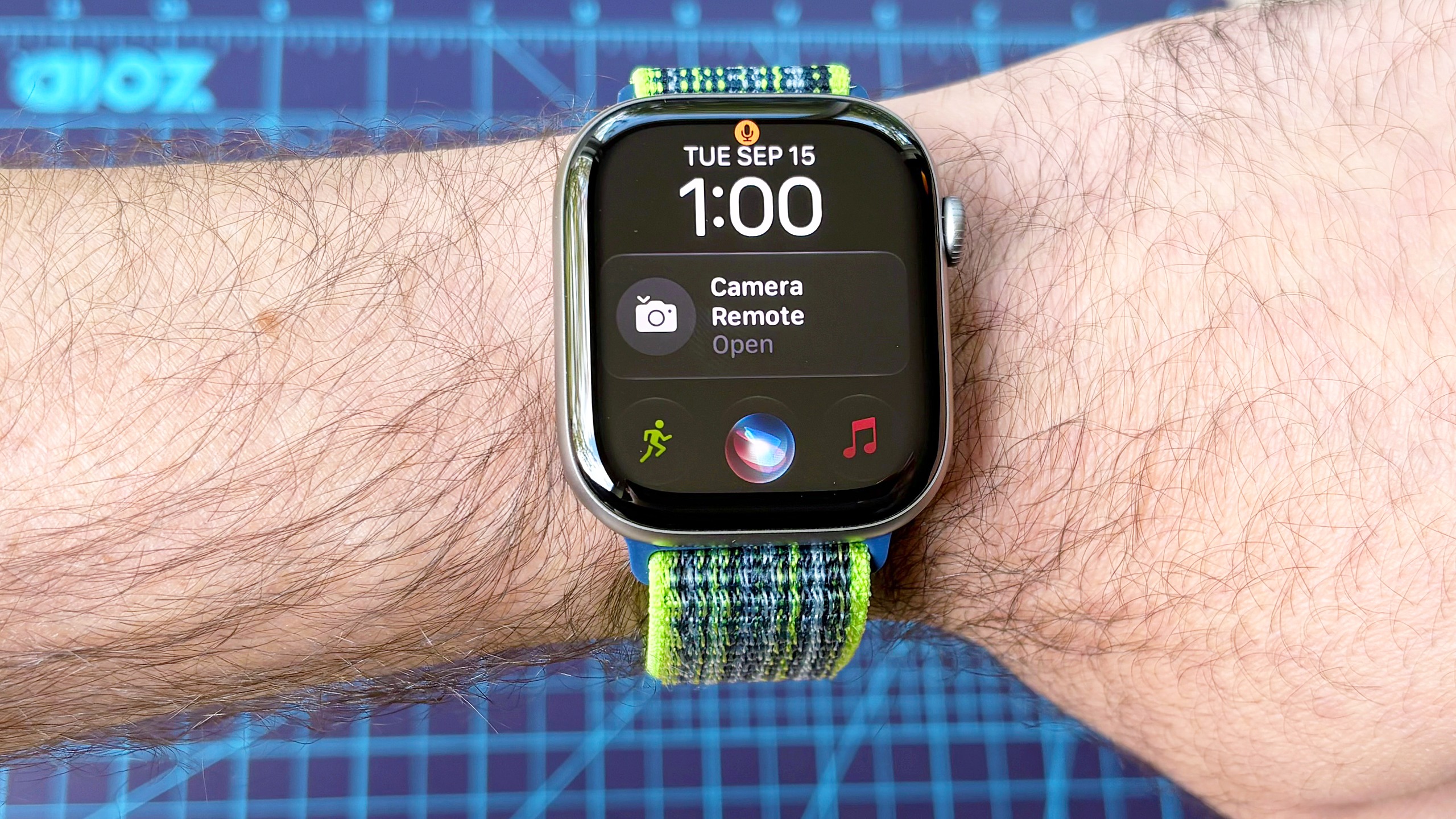 Close-up of the Siri AI setup process using an Apple Watch 11 and iPhone 16 Plus