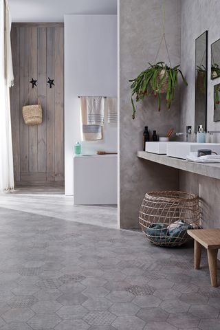modern bathroom with grey stone effect flooring