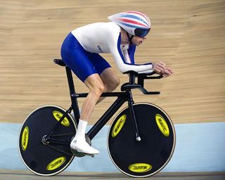 British rider Bradley Wiggins winning gold at the 2008 Beijing Olympics on his 'stealth' machine.