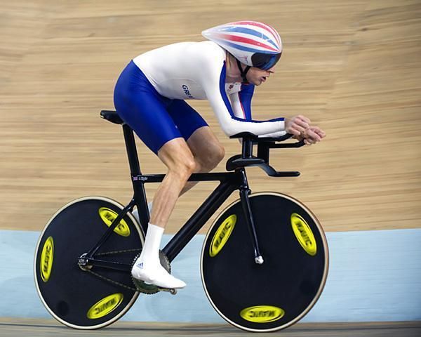 British rider Bradley Wiggins winning gold at the 2008 Beijing Olympics on his 'stealth' machine.