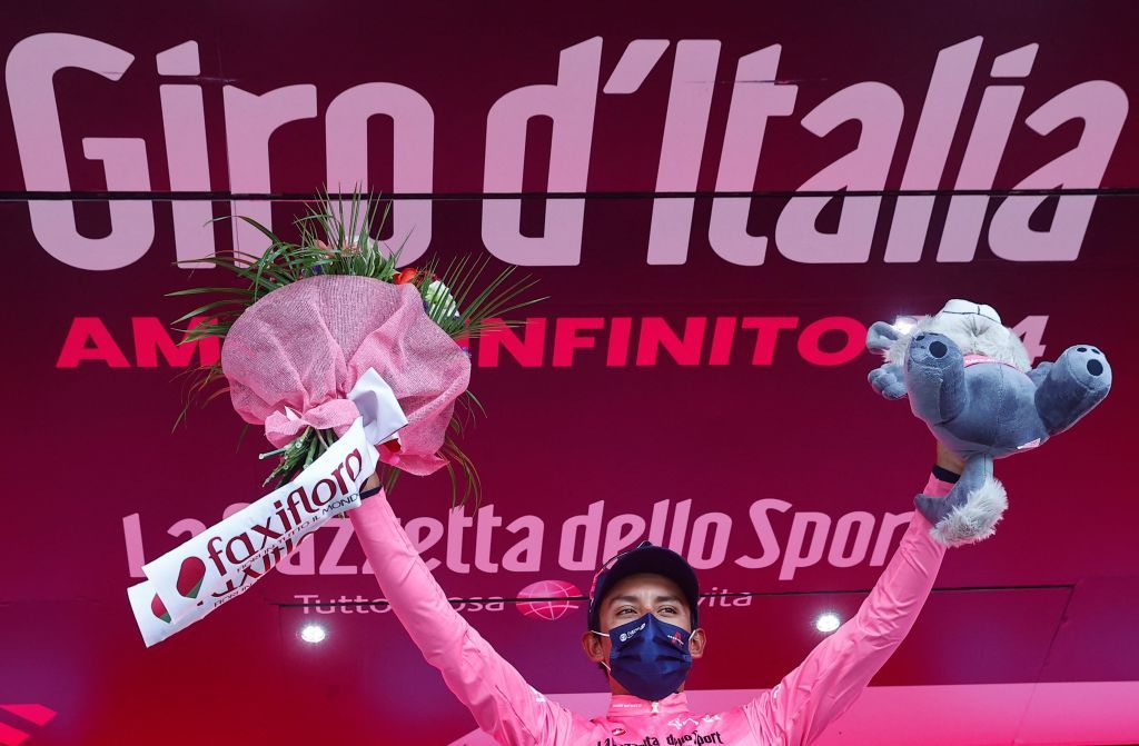 Egan Bernal celebrates on the podium with one day to go to finishing the Giro d&#039;Italia