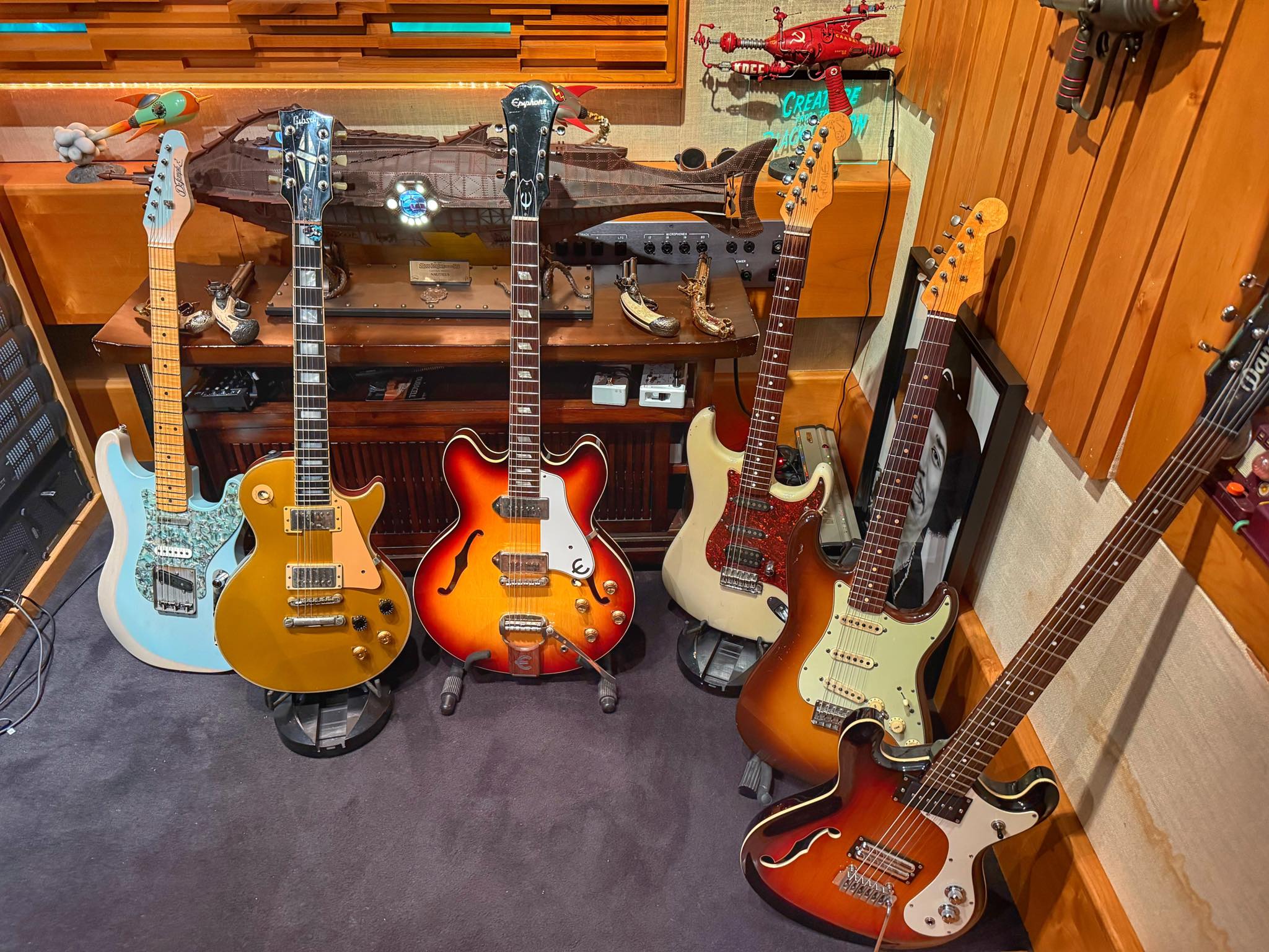 A photo from Rick Springfield's Instagram post showing six guitars he uses, including (second from left) a Gibson Les Paul that he has used heavily for recording and touring, and a baritone guitar on the right that belongs to session guitar ace Tim Pierce