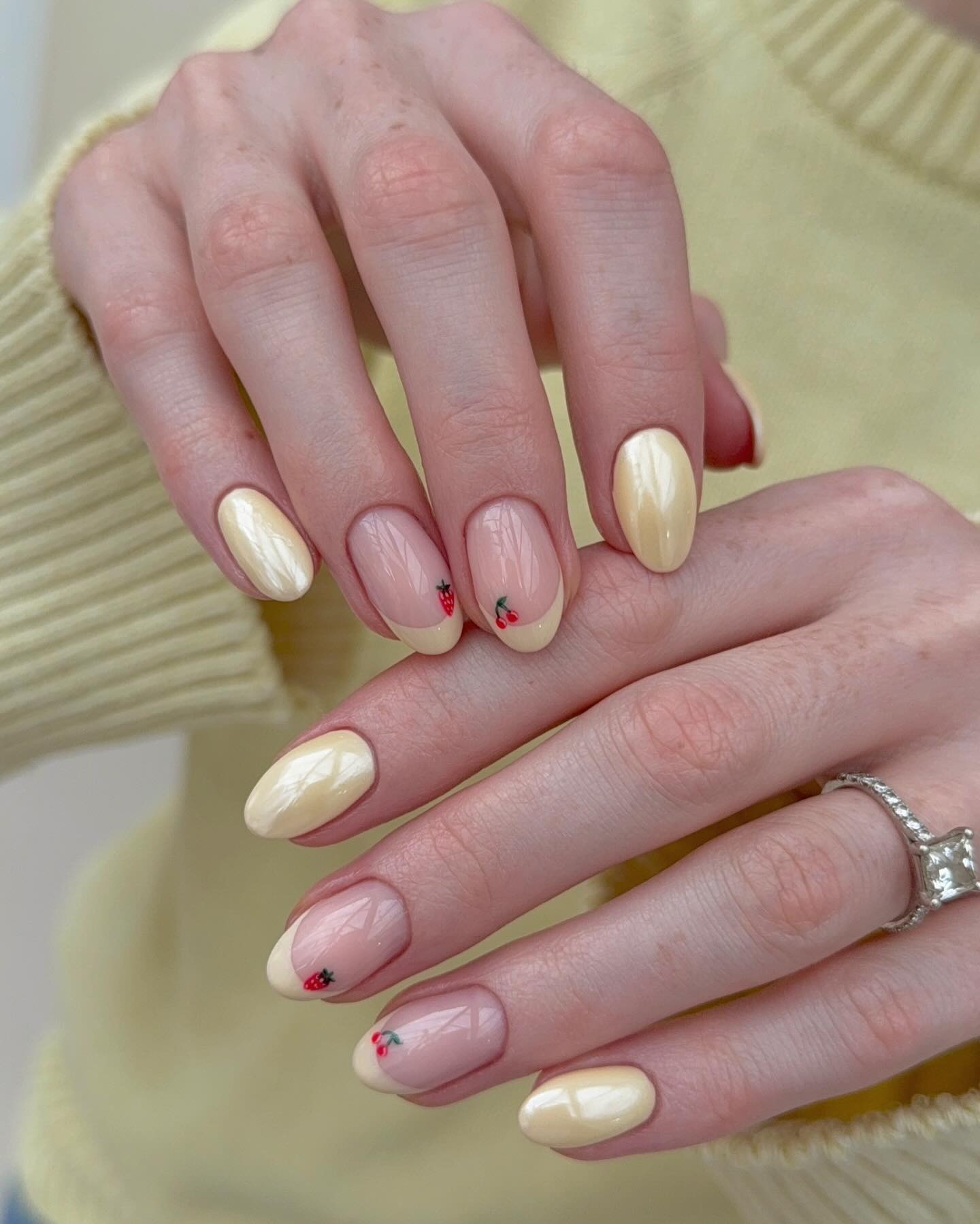 A yellow glazed nail manicure.