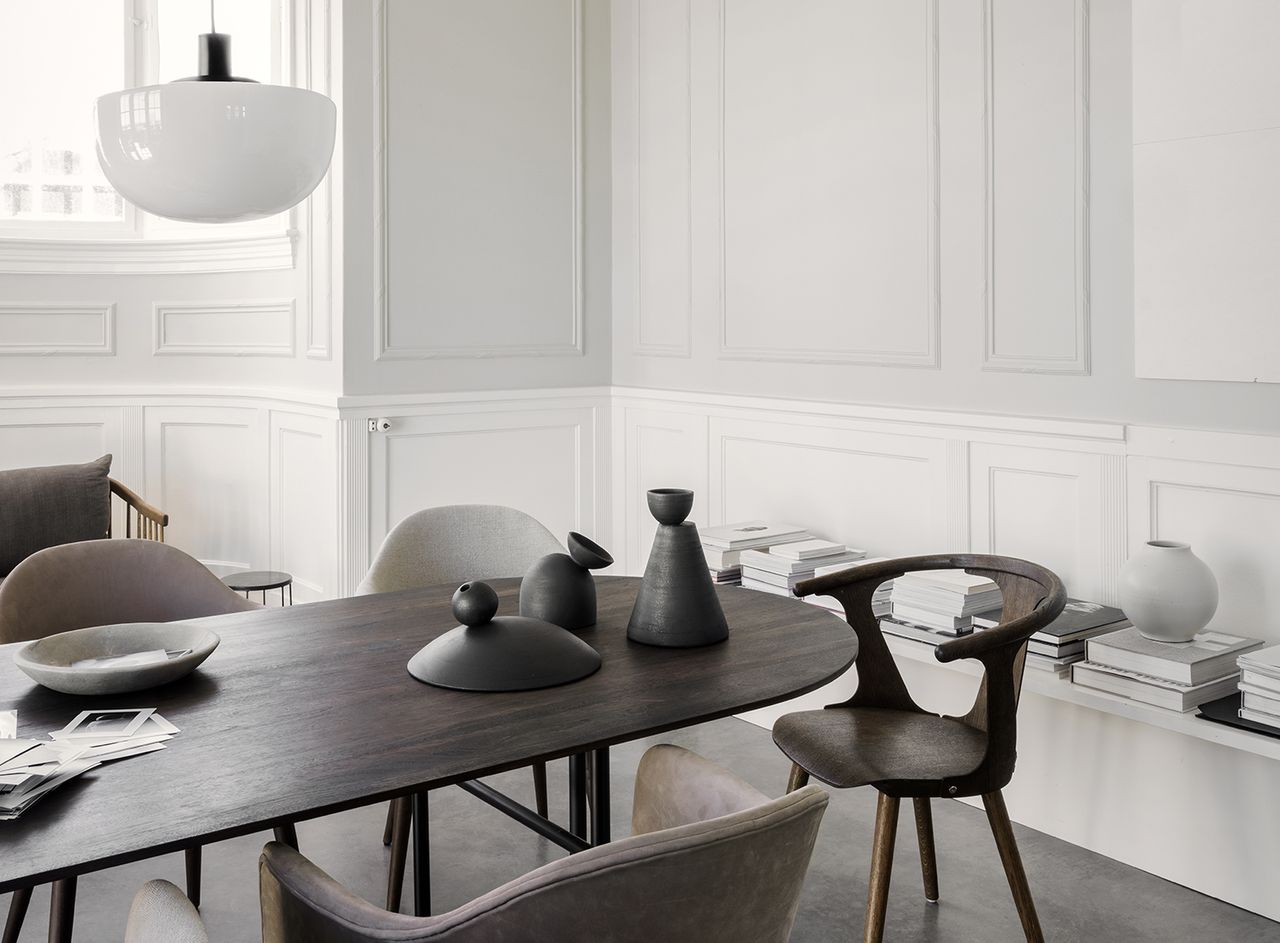 minimalist dining room with wood mid century chairs