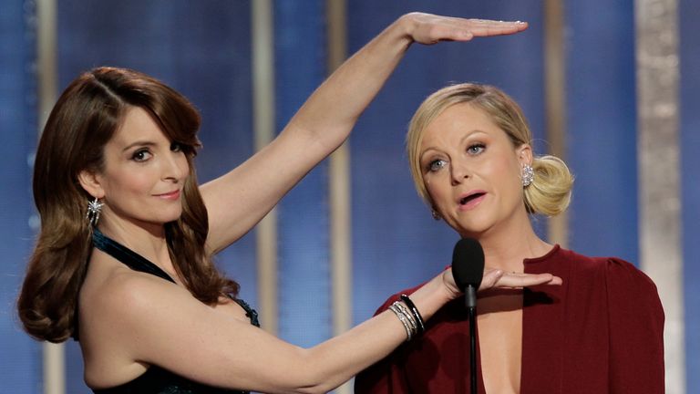 How to watch the Golden Globes: photo provided by NBCUniversal, L to R Tina Fey and Amy Poehler host the 70th Annual Golden Globe Awards at the Beverly Hilton Hotel International Ballroom on January 13, 2013 in Beverly Hills, California. 