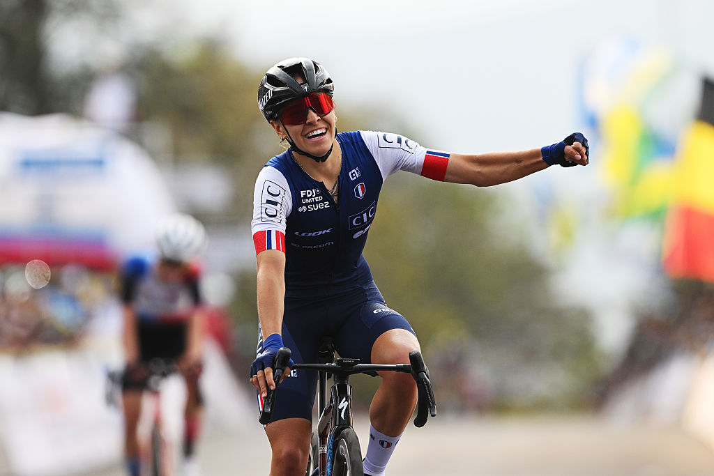 KIGALI, RWANDA - SEPTEMBER 25: Celia Gery of Team France celebrates at finish line as gold medal winner during the 98th UCI Cycling World Championships Kigali 2025 - Women Under 23 Road Race a 119,3 km one day race from Kigali to Kigali on September 25, 2025 in Kigali, Rwanda. (Photo by Dario Belingheri/Getty Images)
