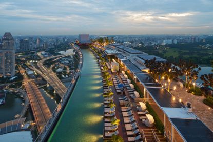 Aerial view of the Marina Bay Sands infinity pool at sunset