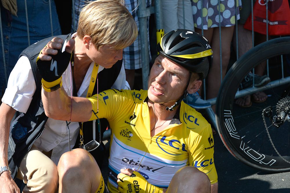 Tony Martin gets medical attention after the stage 6 crash.