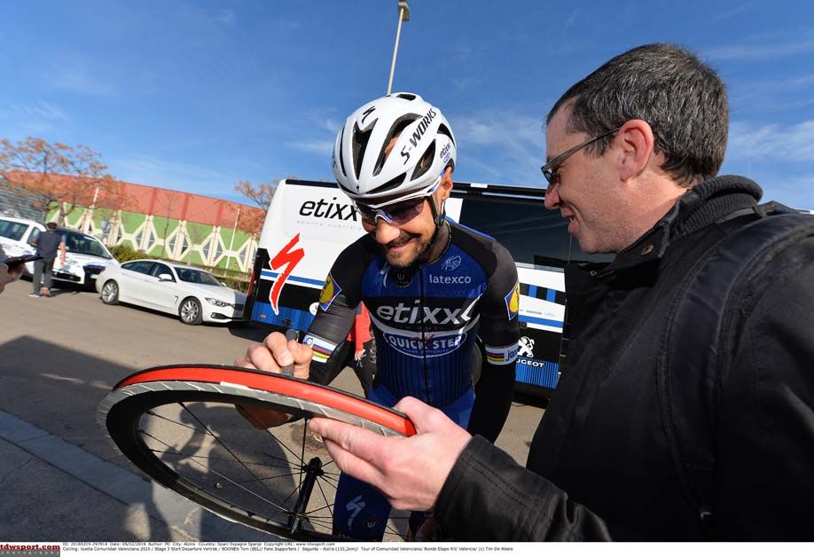 Tom Boonen signs an autograph at the start
