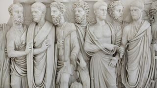 Roman marble sarcophagus with togate men, known as the Sarcophagus of the Brothers, from the middle of the third century A.D., on display in the National Archaeological Museum in Naples, Italy.