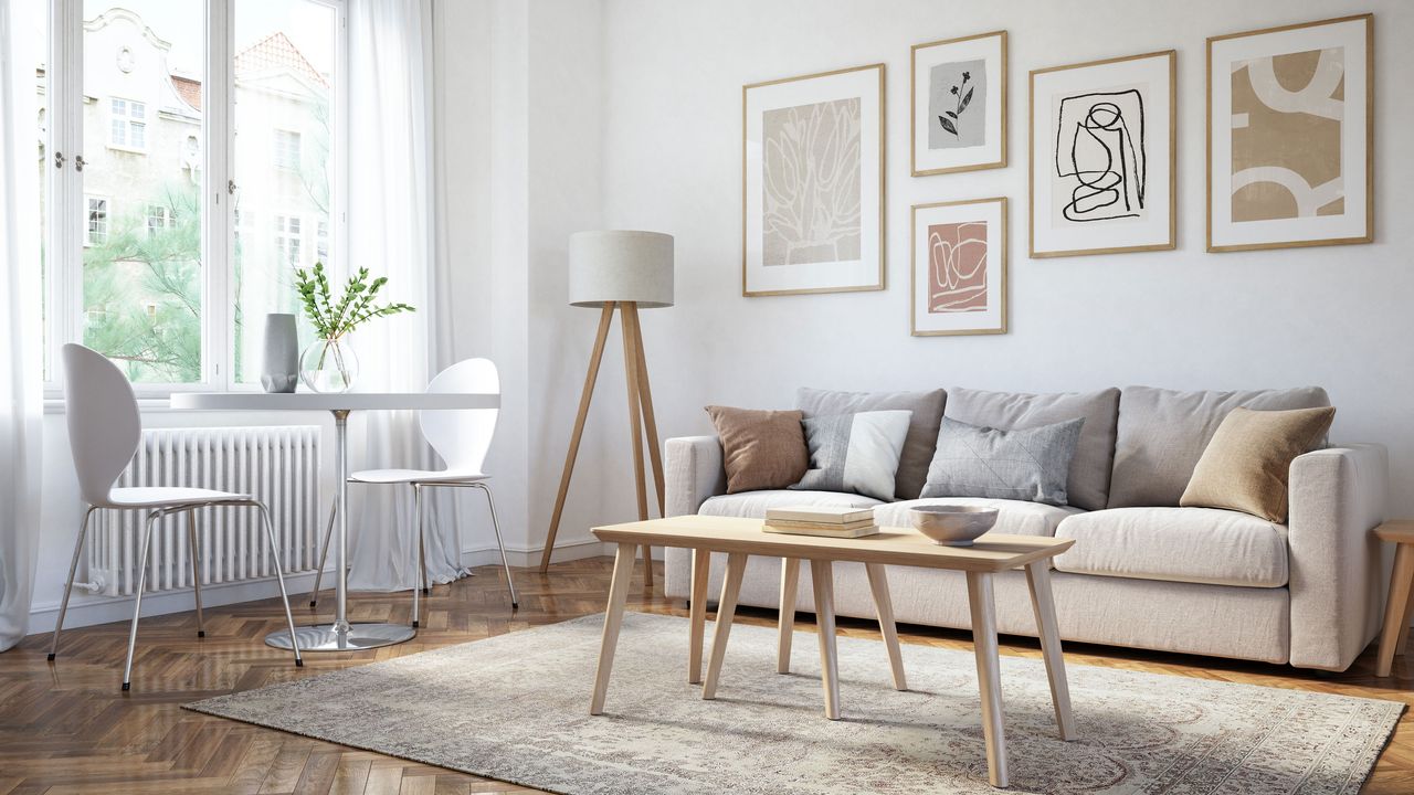 Neutral living room with wooden coffee table and sofa