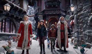 The Christmas Chronicles 2 Mrs. Claus and Santa show Kate and Jack through the North Pole
