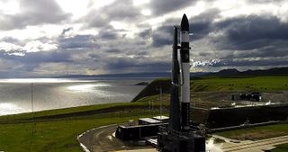 Rocket Lab's Electron booster on the pad in New Zealand ahead of a planned Aug. 26, 2020 liftoff.