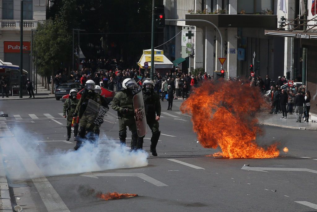 A fire lit by a protester in Athens, Greece over a recent train crash. 