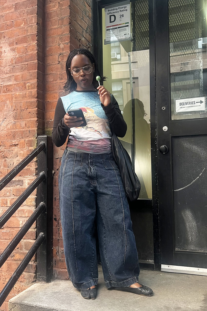 A woman wearing wide-leg jeans