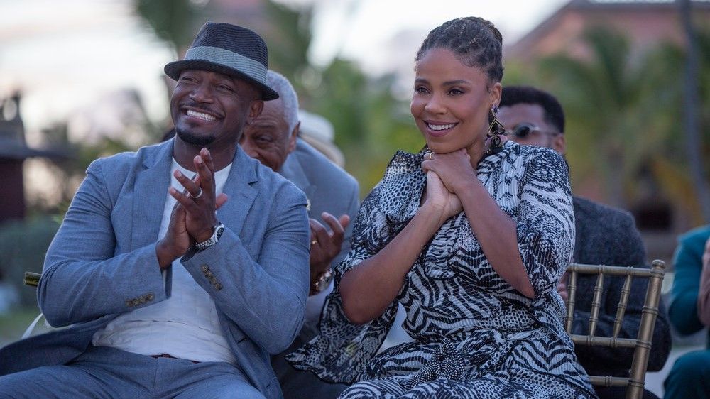 Taye Diggs as Harper Stewart and Sanaa Lathan as Robin at a Quentin&#039;s wedding in The Best Man: The Final Chapters