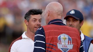 Rory McIlroy and Joe LaCava during the Ryder Cup at Marco Simone