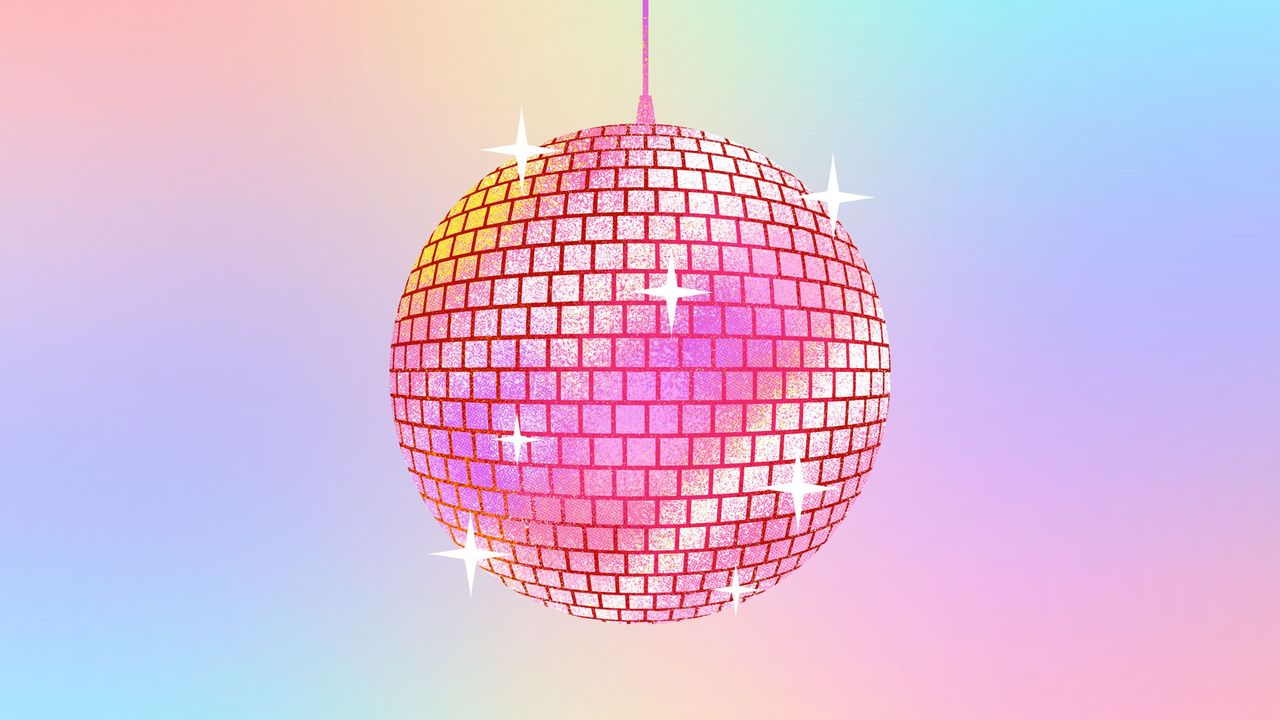 A pink disco ball on a colorful background